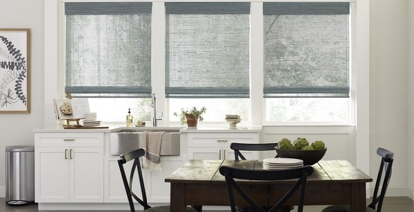 Motorized window blinds featured in a modern home setting.