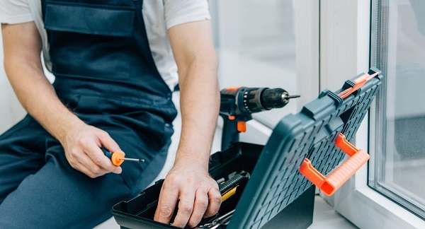 Preparing window blind removal with assorted tools