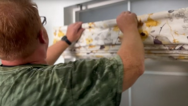All that's left to do is hang your Roman Shades by attaching them to the brackets and securing them with a wingnut All that's left to do is hang your Roman Shades by attaching them to the brackets and securing them with a wingnut