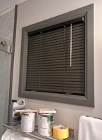 Dark gray color matches my window trim well